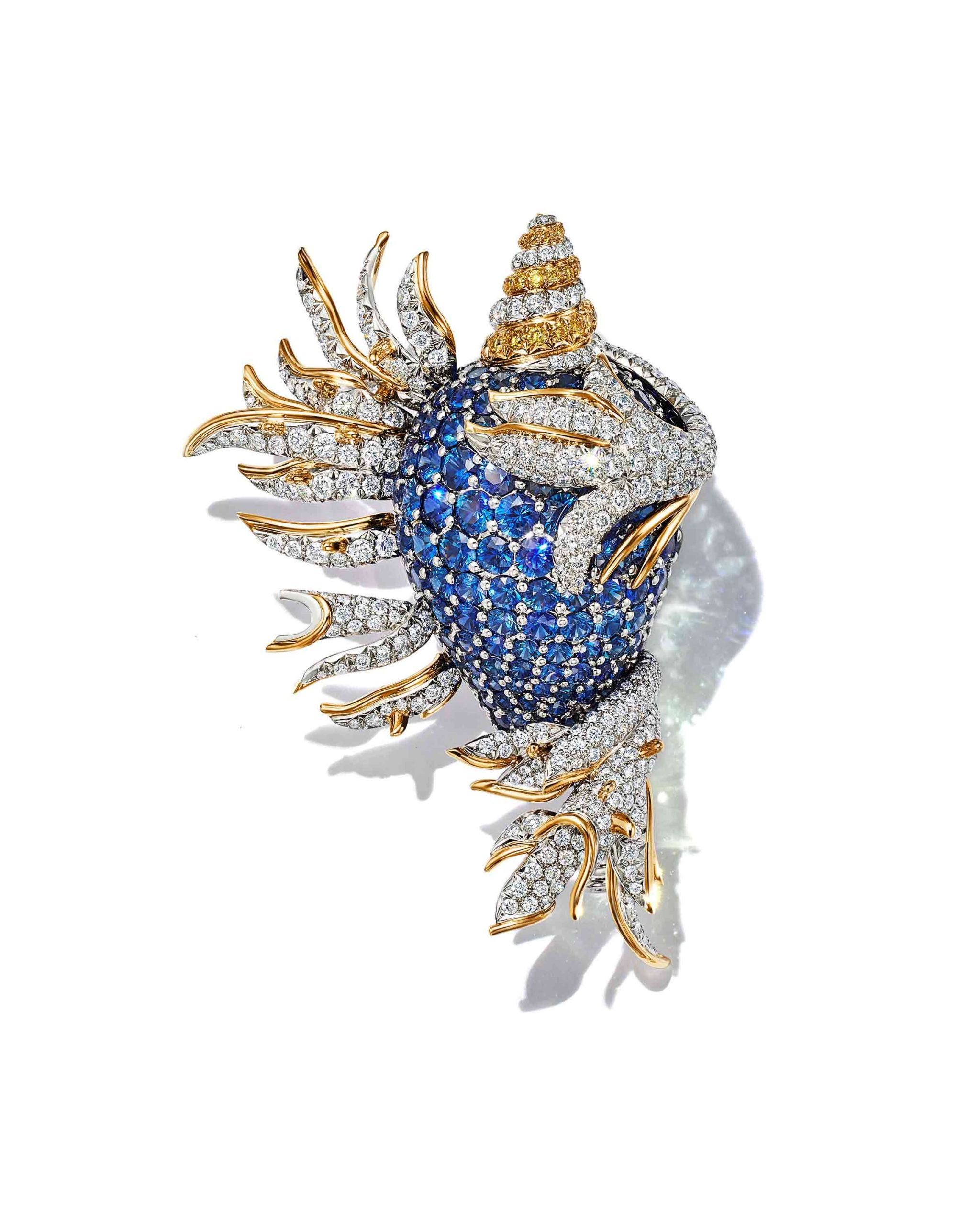 Jean Schlumberger® Coquillage clip in platinum and 18k yellow gold with round sapphires and round yellow and white diamonds